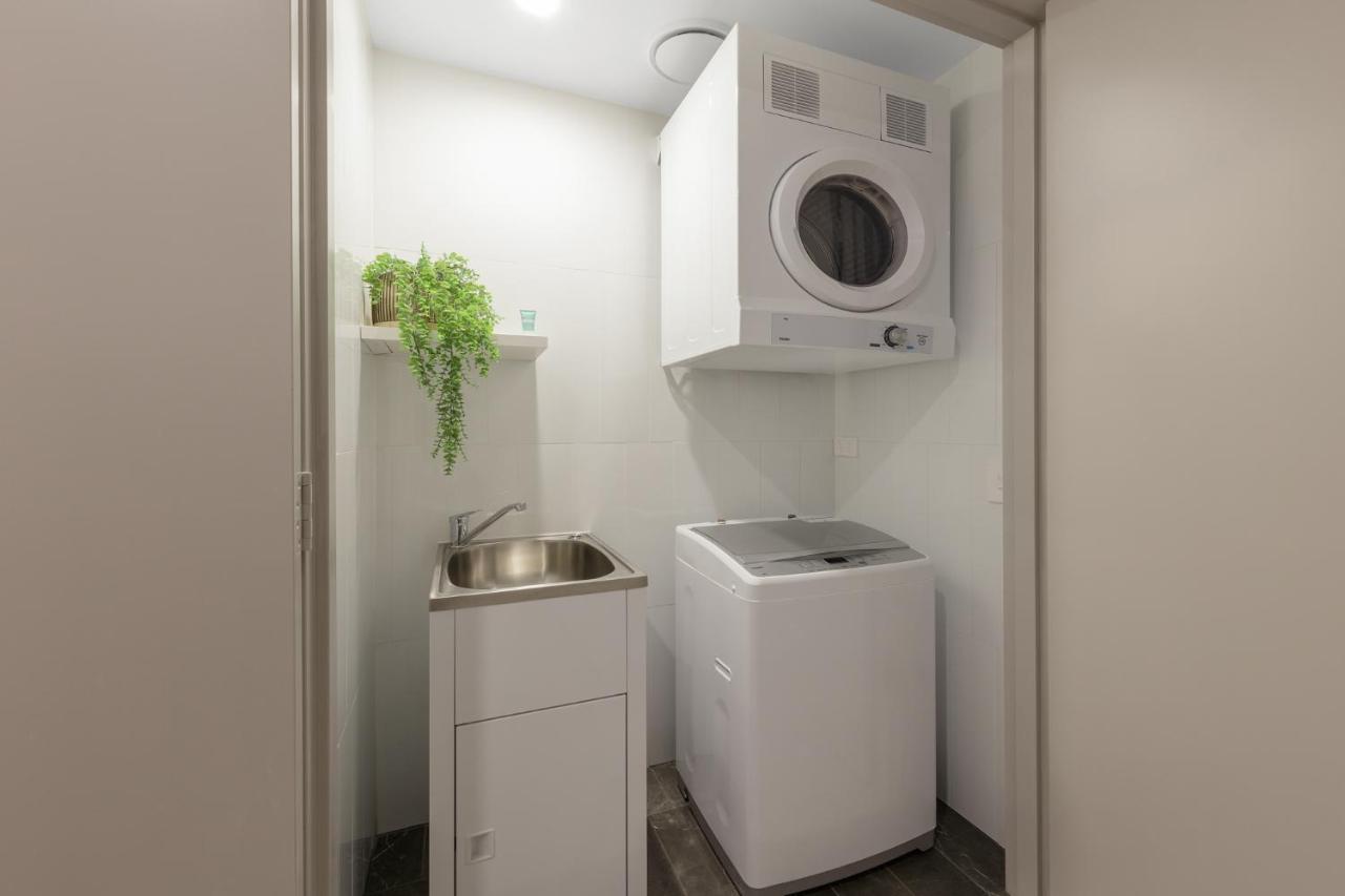 Meriton Suites Pitt Street, Sydney Exterior foto Laundry room