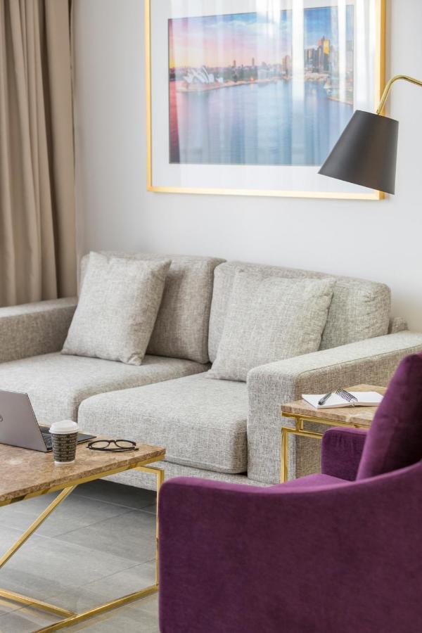Meriton Suites Pitt Street, Sydney Exterior foto A sofa