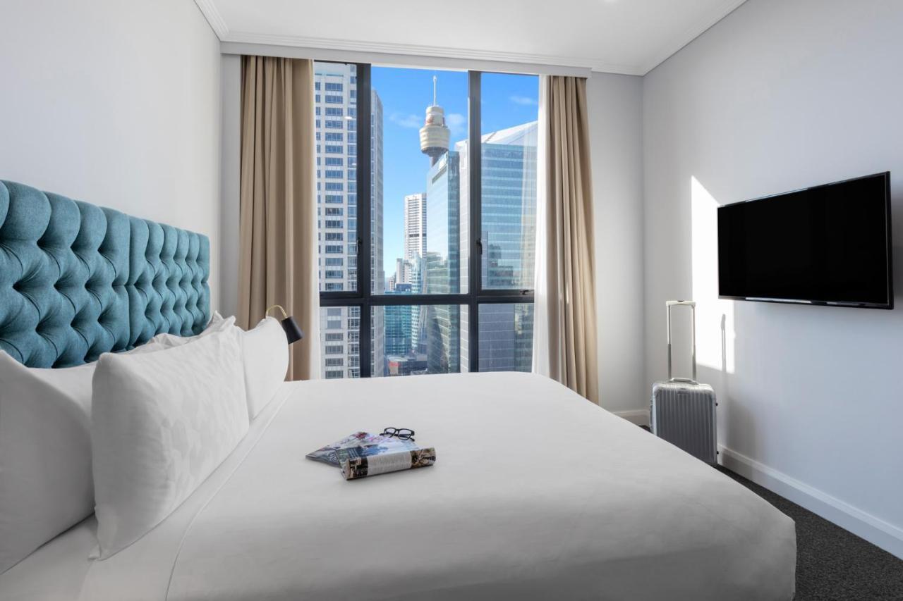 Meriton Suites Pitt Street, Sydney Exterior foto A bedroom at the hotel
