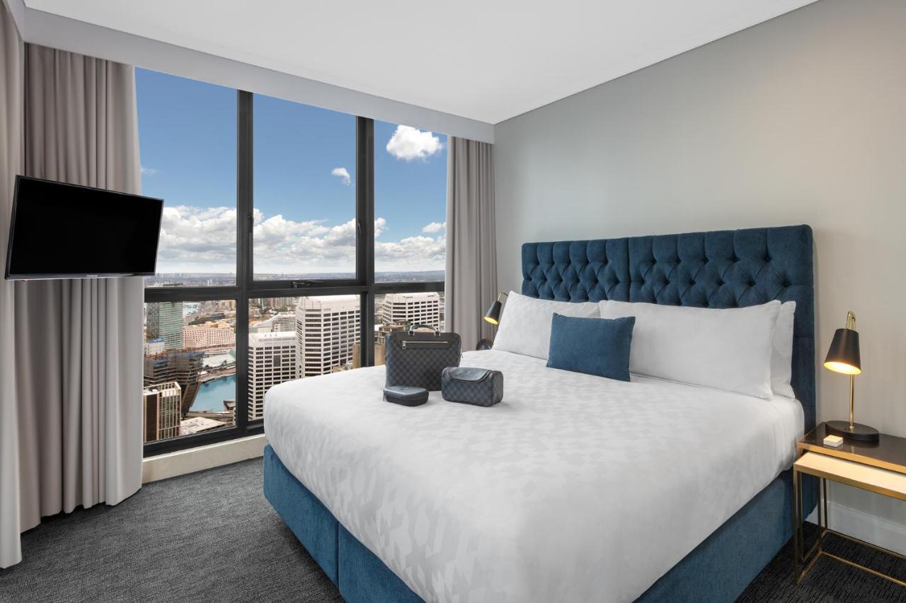 Meriton Suites Pitt Street, Sydney Exterior foto A bedroom at the hotel
