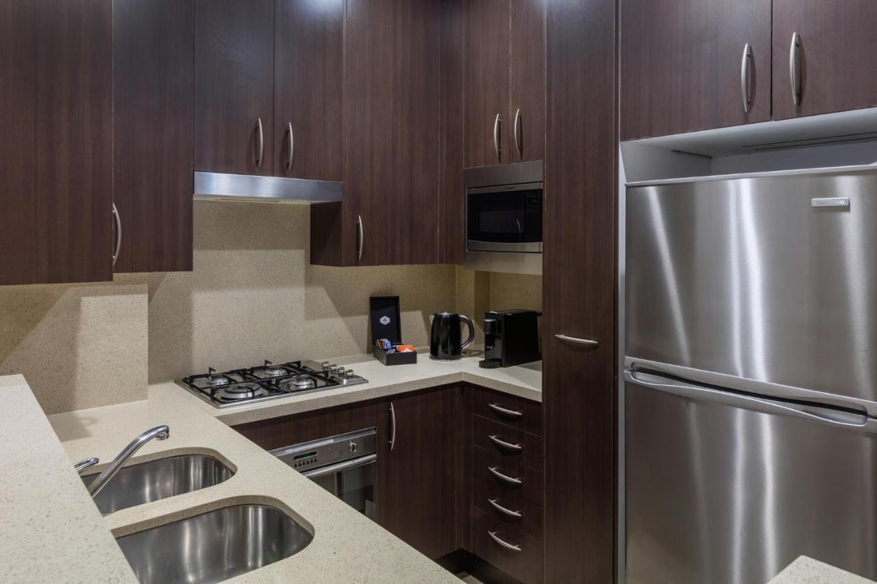 Meriton Suites Pitt Street, Sydney Exterior foto A typical kitchen in a serviced apartment